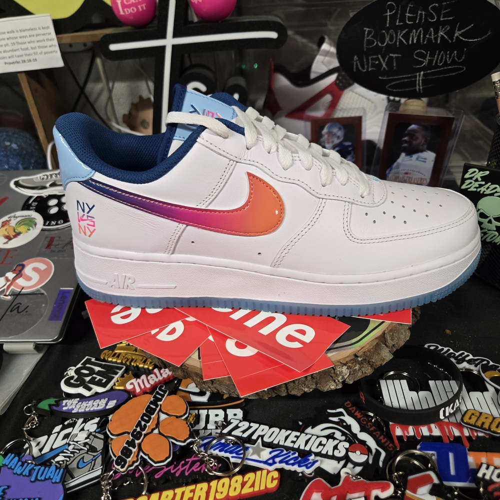 White Sneakers with Orange and Pink Swoosh